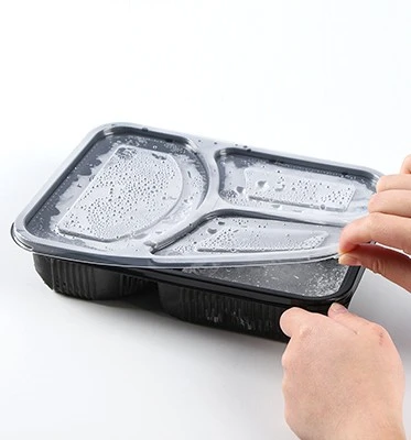 Les contenants noirs pour les repas se sont-ils sûr?